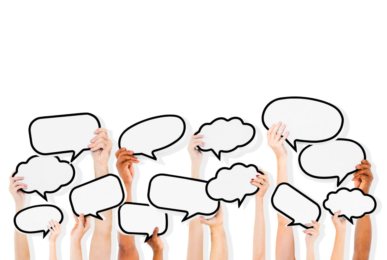 Group Of Multi-Ethnic People Holding Empty Speech Bubbles