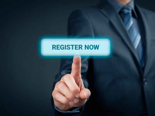 Register now concept. Businessman click on virtual button with text register now.